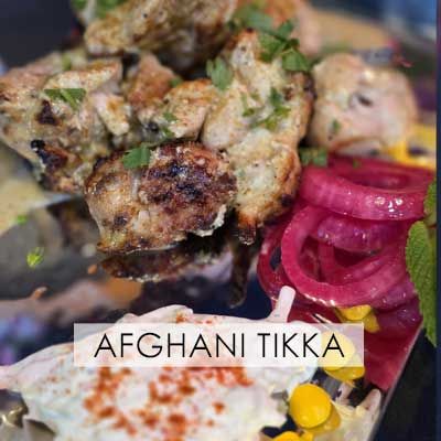 Char-grilled Afghani Chicken Tikka with onions