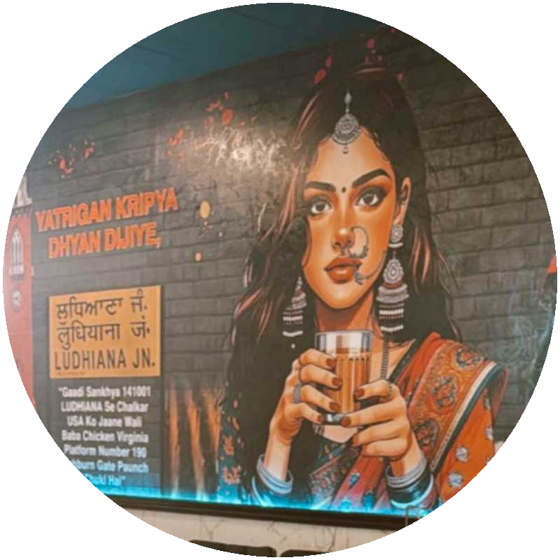 Ludhiana Junction mural inside Baba's, a woman holding chai